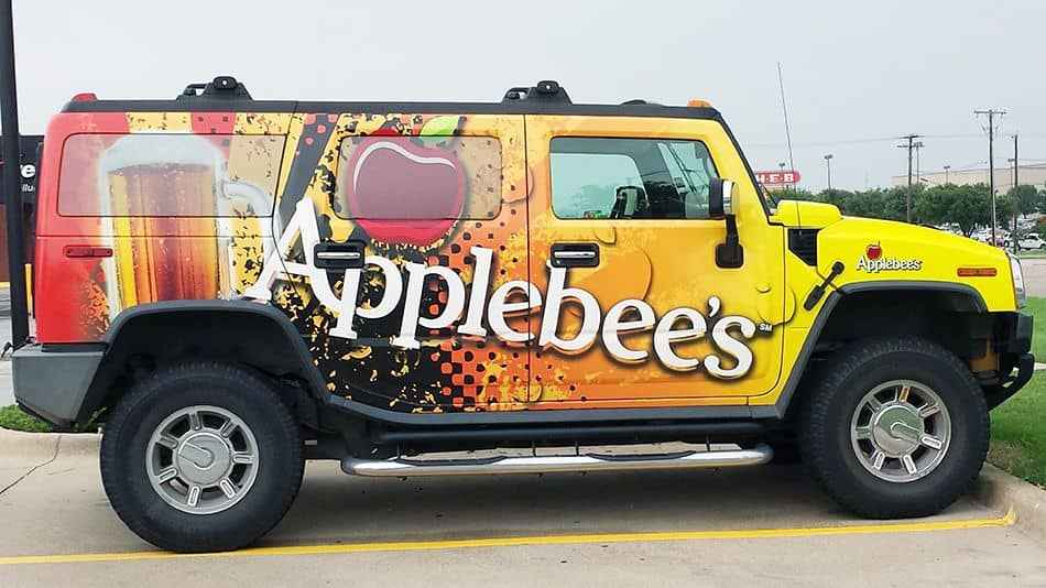 passive income ideas - image of a car promoting the brand Applebees